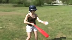 Shelby playing baseball