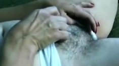 Hairy older lady shows her bush